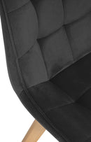 Moderner Esszimmerstuhl mit Samtbezug und Holzgestell