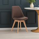 Moderner Esszimmerstuhl aus Kunststoff und Stoff mit Holzgestell