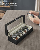 Watch Box with 6 Slots, Watch Case with Glass Lid, Velvet Watch Pillows, Watch Holder with Clasp, 11.2 x 30 x 8 cm, Gift Idea, Black Synthetic Leather, Greenish Grey Lining JWB06BE